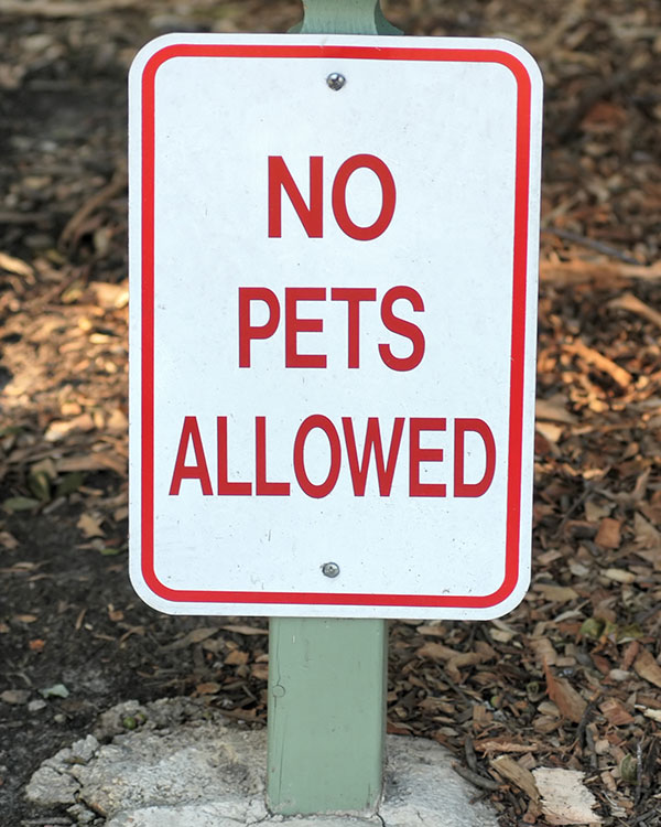 Sign. Text reads: No Pets Allowed