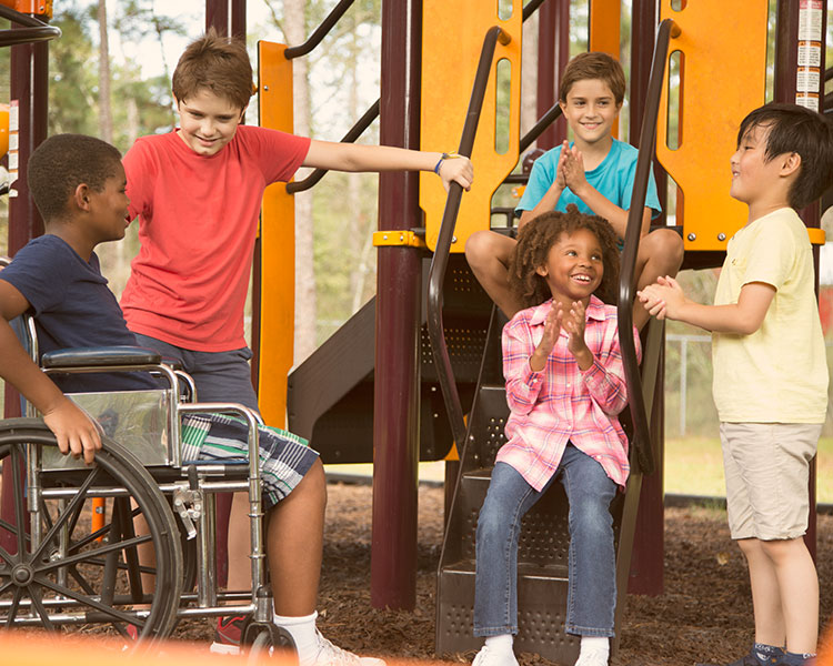 Five kids hanging out at a playground