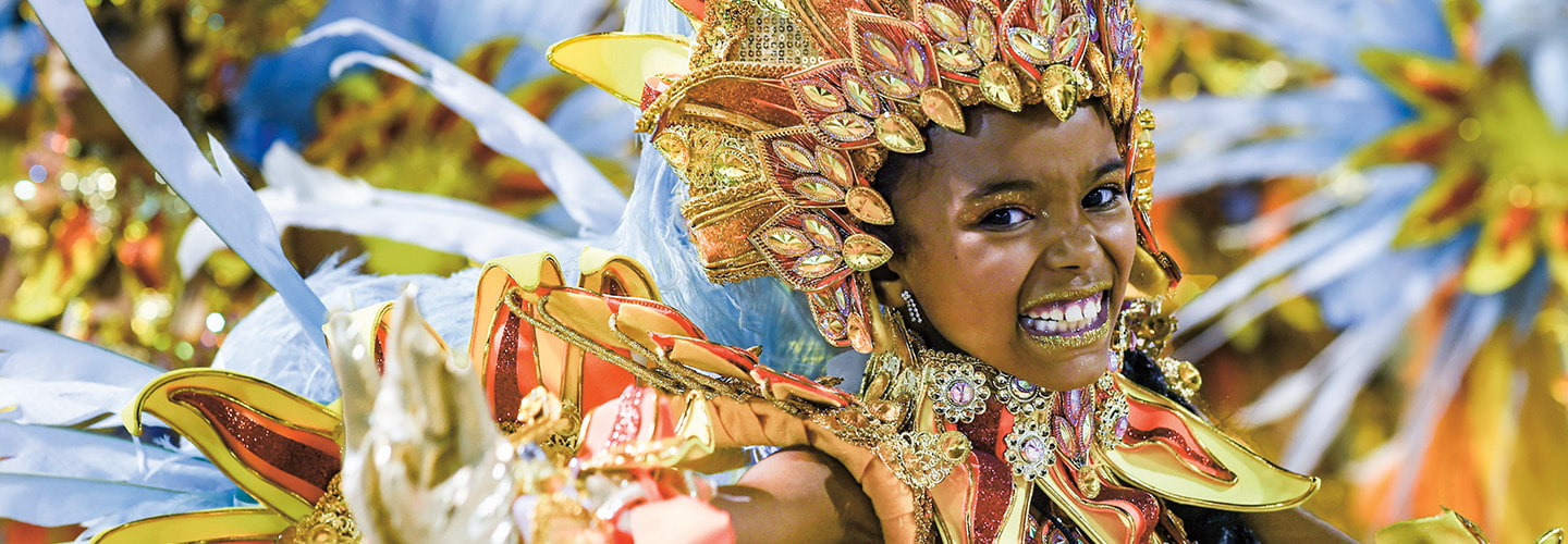 Photo of a person dressed in a colorful, fantastic costume