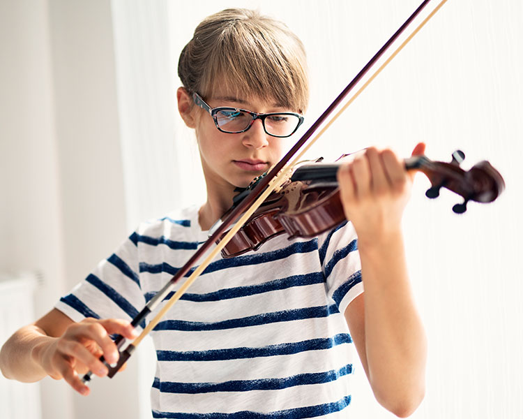 Photo of a student playing violin