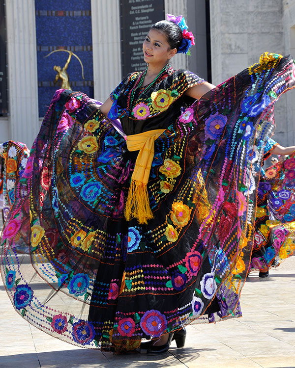 Person wearing beautiful, colorful long dress