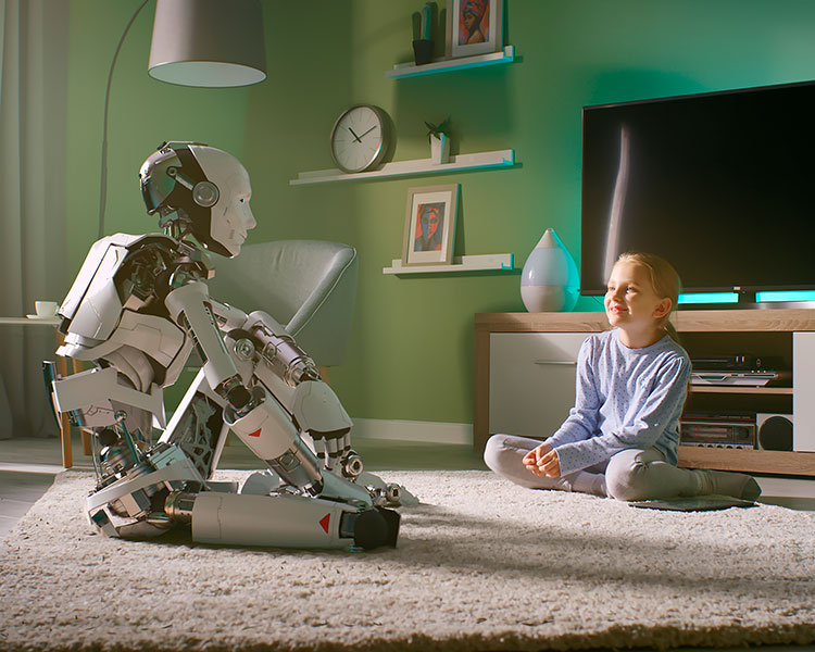 Photo of a kid sitting across from a robot kid