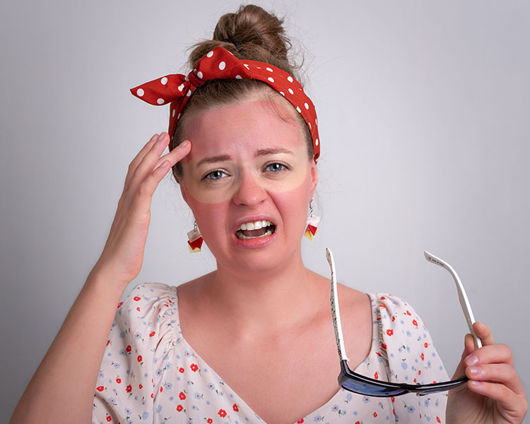 Photo of an upset person with a sunglasses sunburn