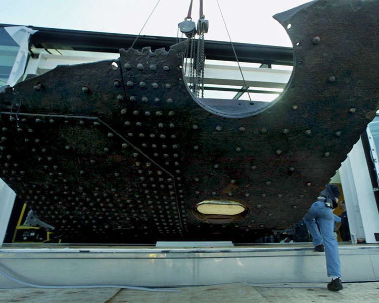 Image of a large plate that holds a ship together