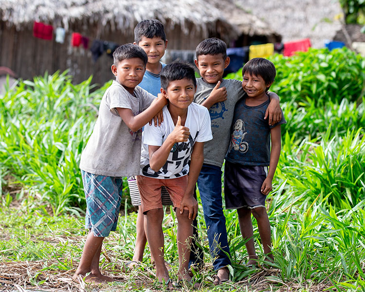 Photo of five children posing together