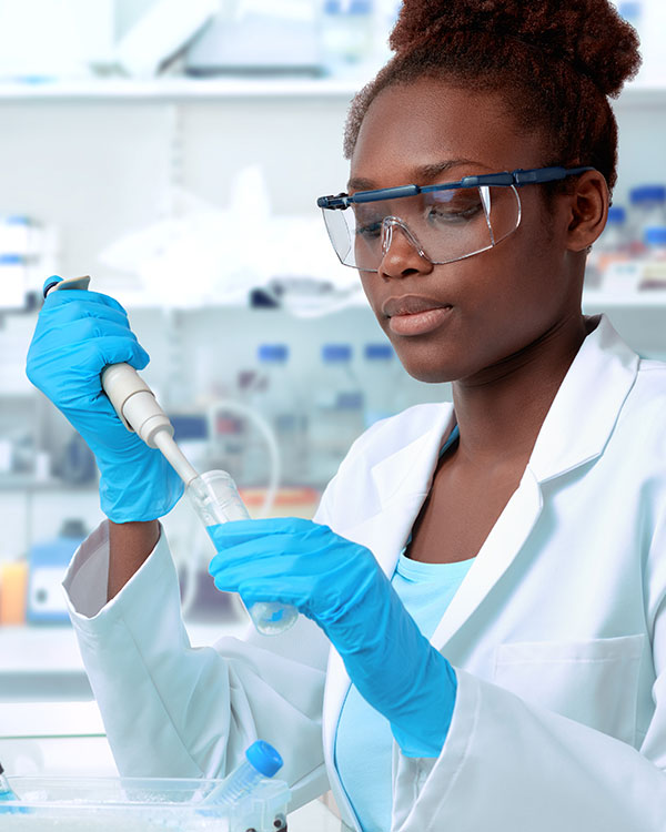 scientist working with test tubes